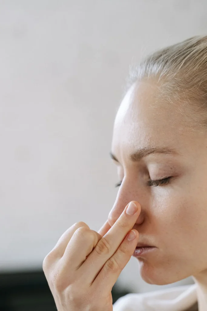 Photo highlighting blood vessels in the nasal area associated with dermal filler safety concerns.