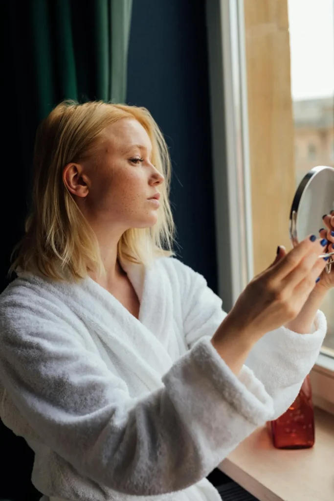 Woman learning facts about Botox ingredients, formulation, and common misconceptions about botulinum toxin.