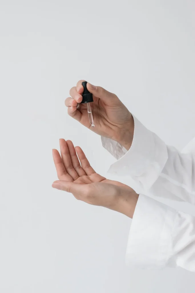 Close-up illustration of injectable moisturisers delivering hyaluronic acid into skin for deep hydration