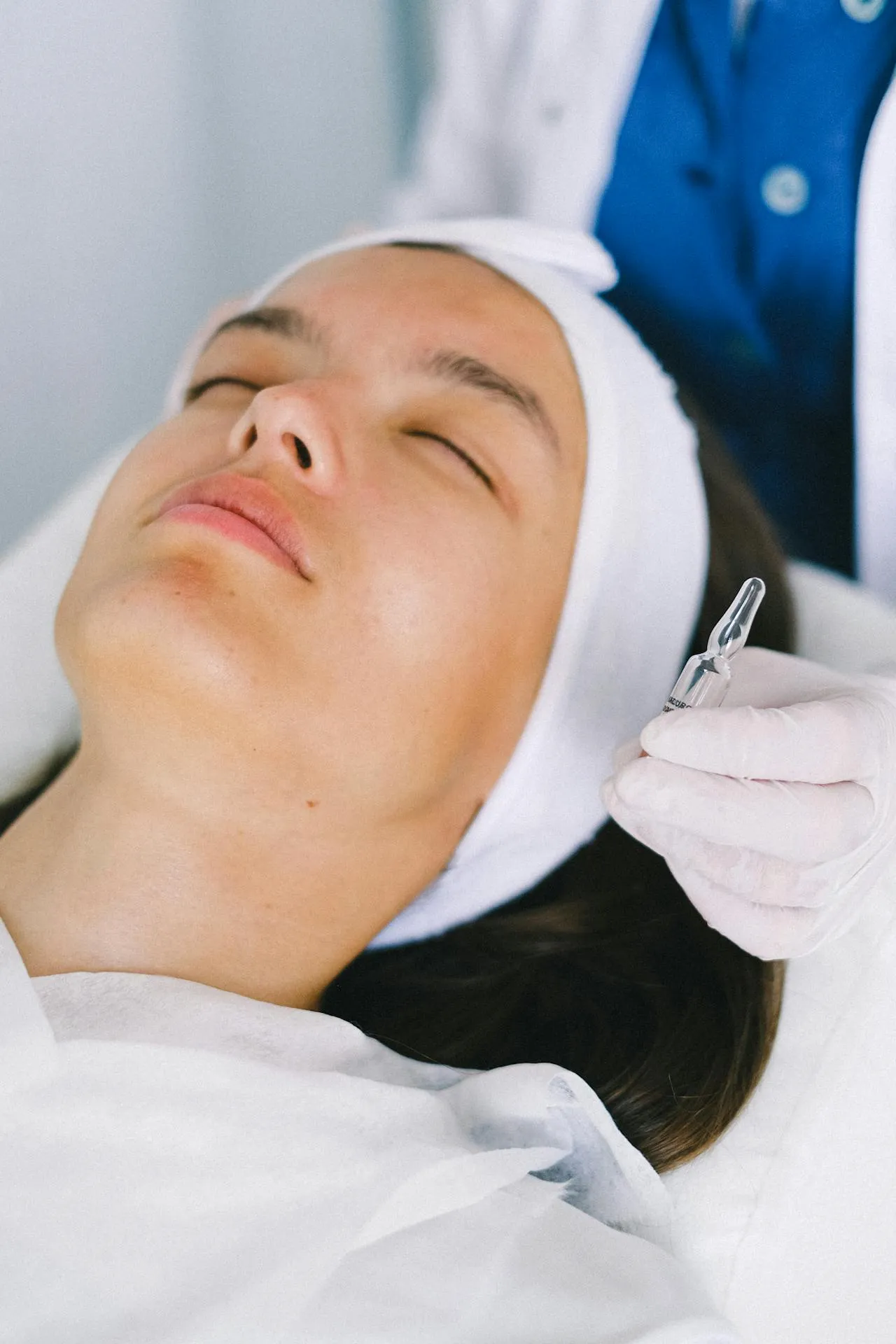 Aesthetic practitioner performing skin booster injections to improve facial hydration and skin quality