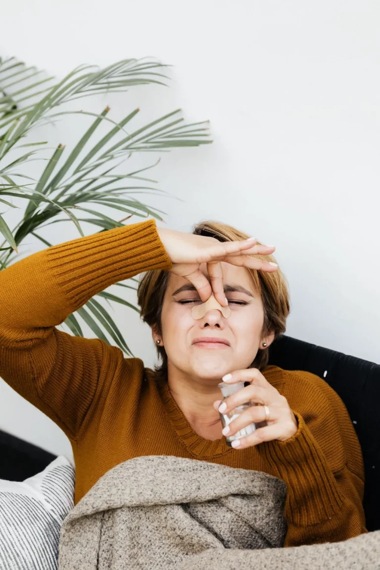 Patient thinking about non-surgical rhinoplasty and potential nose filler risks.