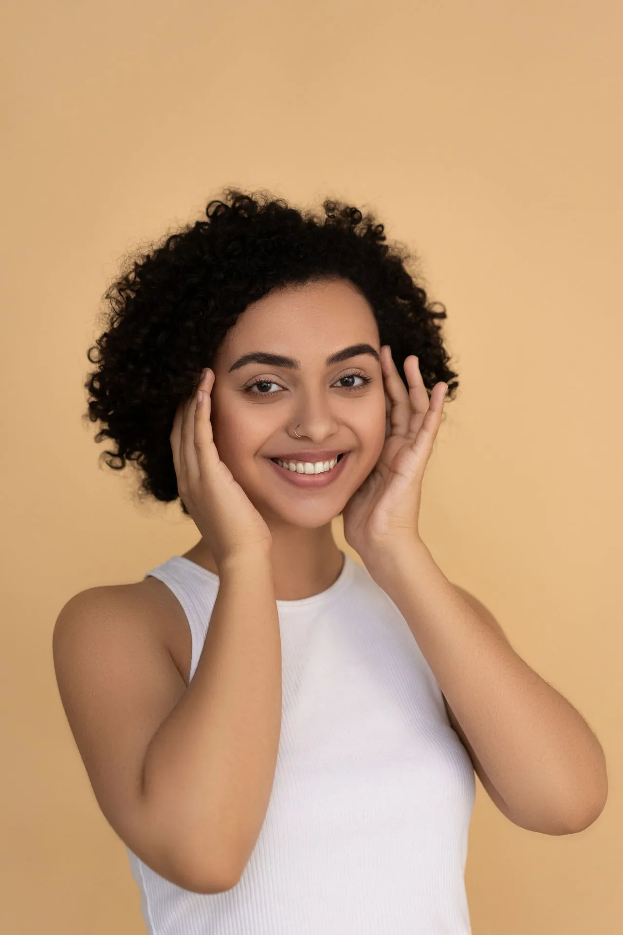 Close-up portrait highlighting cheek filler treatment